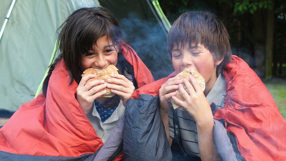 UK economy grows on camping and dining out