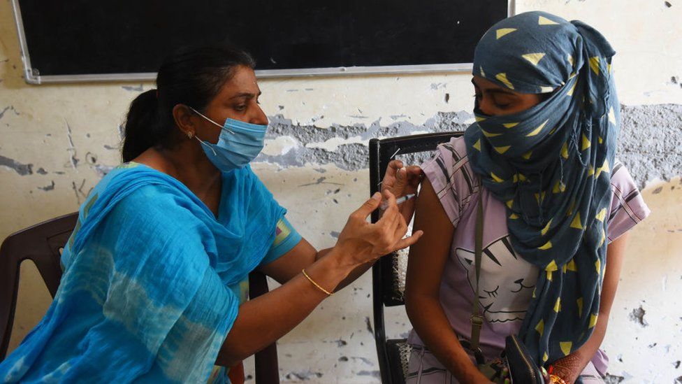 More than half of Indian adults have had first jab