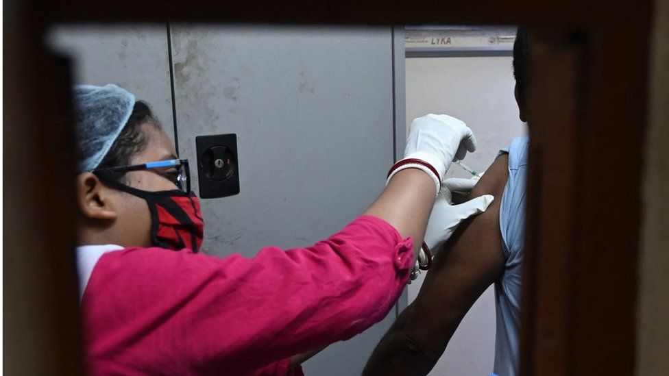India to start vaccinating all adults over 18 amid surge in infections