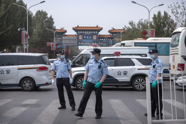 Beijing closes food market after more than 50 test positive for coronavirus