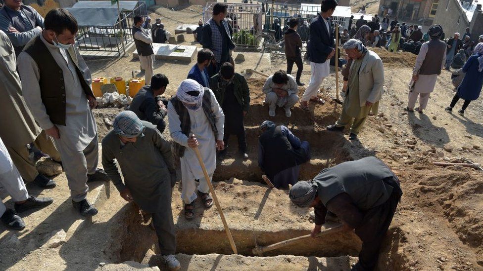 Kabul attack: Families bury schoolchildren of blast that killed 50